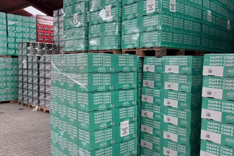 Pallets chips in het magazijn van Firma Reinders